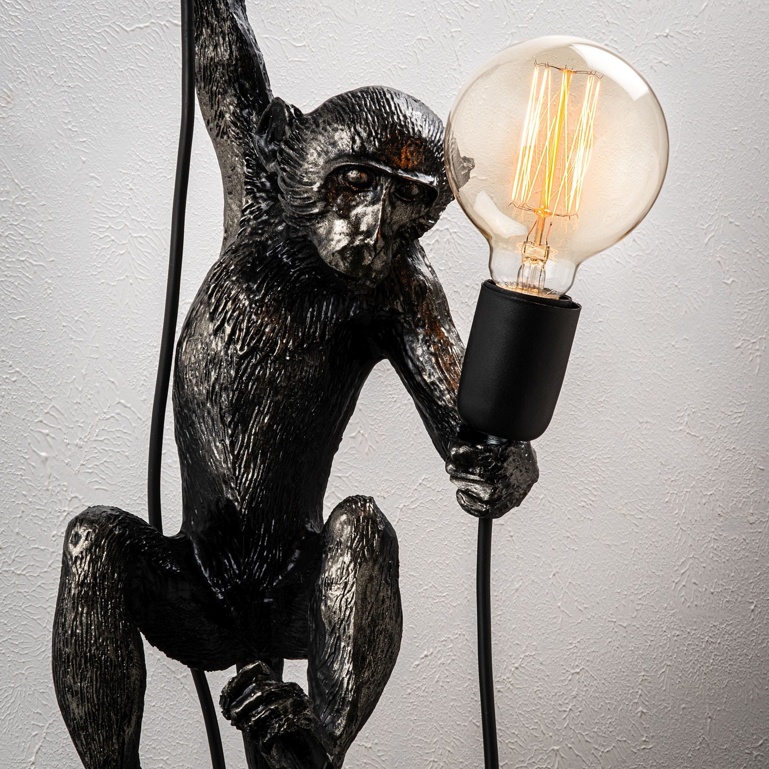 Lampa ścienna Proffitz z małpką czarna