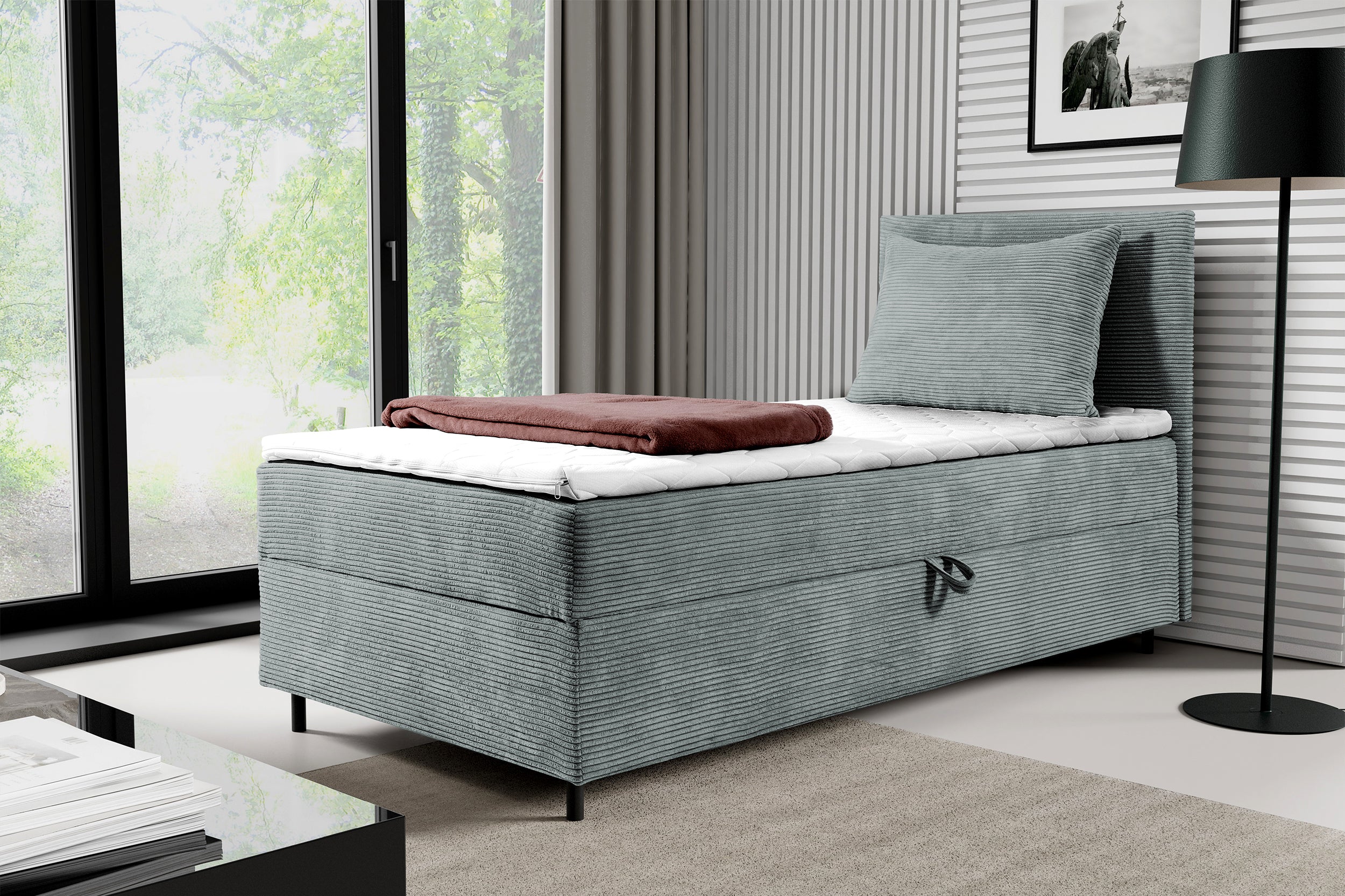 Łóżko kontynentalne jednosobowe Montigo Mini 80x200 cm z pojemnikiem, topperem i poduszką jasnoszare sztruks nogi czarne prawostronne