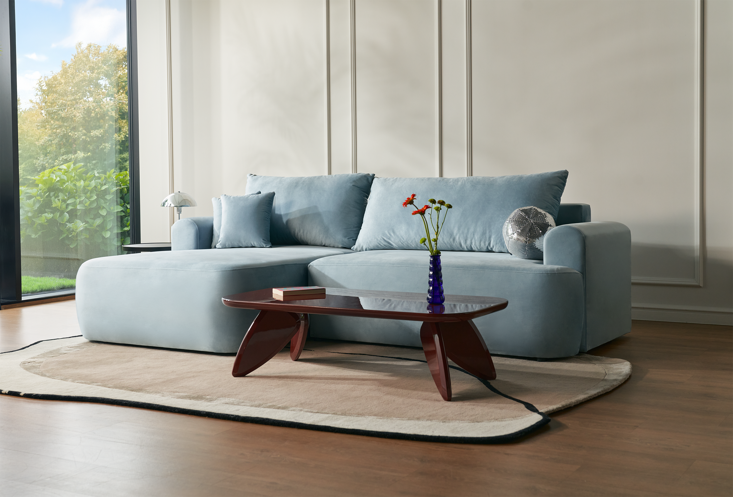 Narożnik z funkcją spania Ovo L-kształtny lewostronny z pojemnikiem błękitny welur hydrofobowy