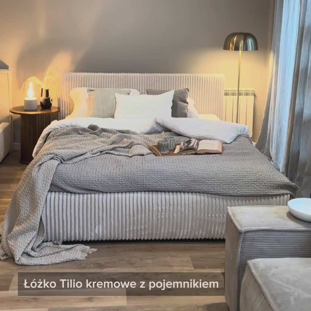 Załaduj wideo: Łóżko tapicerowane 160x200 cm Tilio z pojemnikiem stelaż metalowy szare gruby sztruks